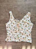 Front view of Keroppi crop tank top showing pattern and cut