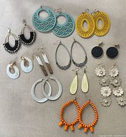 Group shot showing all 11 pairs of earrings