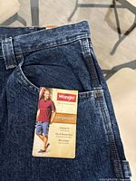 Front view showing brand tag and carpenter styling