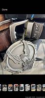 Close-up Harley-Davidson eagle buckle and adjacent belt