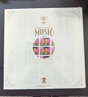 Full sealed sheet showing central circle of Elvis Presley stamps and Legends of American Music title