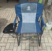 Front view of Coastrail folding camp chair with tray