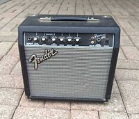 Front view showing Fender logo, grille cloth, control panel