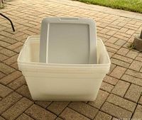 Stacked bins with one lid displayed