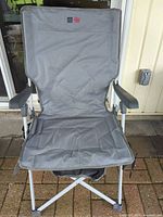 Full front view of gray Hot Seat folding camp chair set up