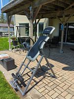 Full view of inversion table set up outdoors