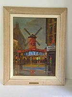 Full view of framed Moulin Rouge painting