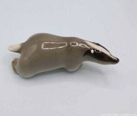 Side view showing full figurine profile