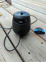 Front view of Thermacell repeller with USB cable and cartridge