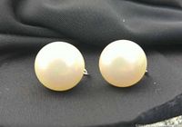Front view of both faux pearl earrings