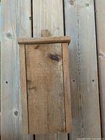 Front view of unfinished wooden bat house