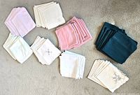 Overview of seven stacks of napkins showing all colors and patterns