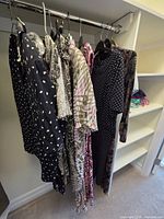 Rack of assorted dresses and sets hanging