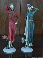 Both Art Deco style figurines full view