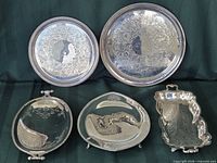 Group shot of all five silver-plate trays