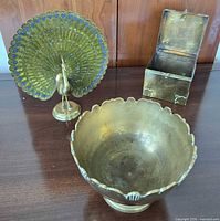 Group view showing bowl, peacock figurine and trinket box