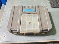 Closed gray Mastercraft Maximum carrying case with clear compartment