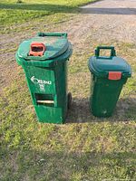 Front view of both green Ottawa bins standing side by side