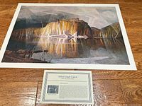 Full view of unframed landscape print with artist information card