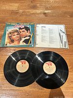 Front jacket plus both vinyl records and lyric insert displayed