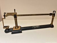 Full view of Henry Troemner balance scale showing brass beam, cast iron base, pillars and pointer