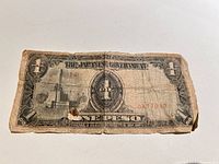 Obverse of the Japanese Government one peso note showing serial 0477037 and wear