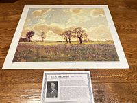 Full view of lithograph print with border on tabletop