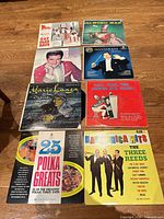 Eight LPs laid out showing front covers