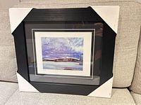 Front view of framed Canoe Lake print with protective corner covers