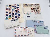 Group view of assorted first day covers, state flag panes, USA 15¢ stationery