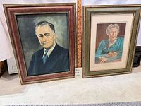 Front view showing both framed portraits side by side