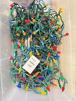 Multicolour faceted C6 string lights in storage bin