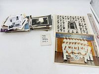 Overall view of photo stacks and two large class portraits