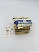 Stack of View-Master reels in sleeves with note showing lot count