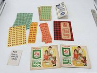 Group shot of all saver books and loose stamp sheets