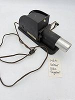 Left side view showing Vokar badge, power cord, overall body
