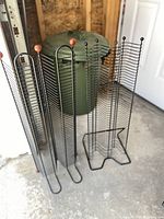 Both black wire CD racks front view