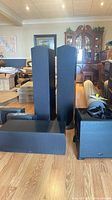 Two Studio 60 towers, Studio CC-590 center; cube subwoofer also visible but not included