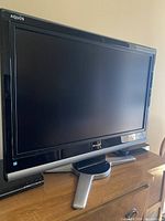 Front view of Sharp Aquos LCD TV on stand