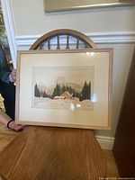 Front view of framed watercolour on chair