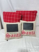 Front view of all four pillows, showing patterns and writable panels