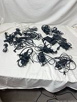 Overhead view showing all power adapters spread on surface
