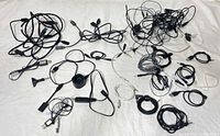 Overhead view showing all tangled and loose cables spread on surface