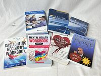 All seven items laid out to show covers