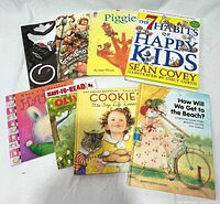 All nine books laid out showing covers