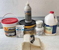 Group shot of all concrete repair supplies showing brands and container sizes