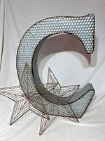 Front view of galvanized letter C with both wire stars