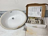 sink, faucet box, hardware bag overview