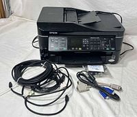 Printer front with bundled cables and ink pack