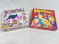 Front view of both boxed board games